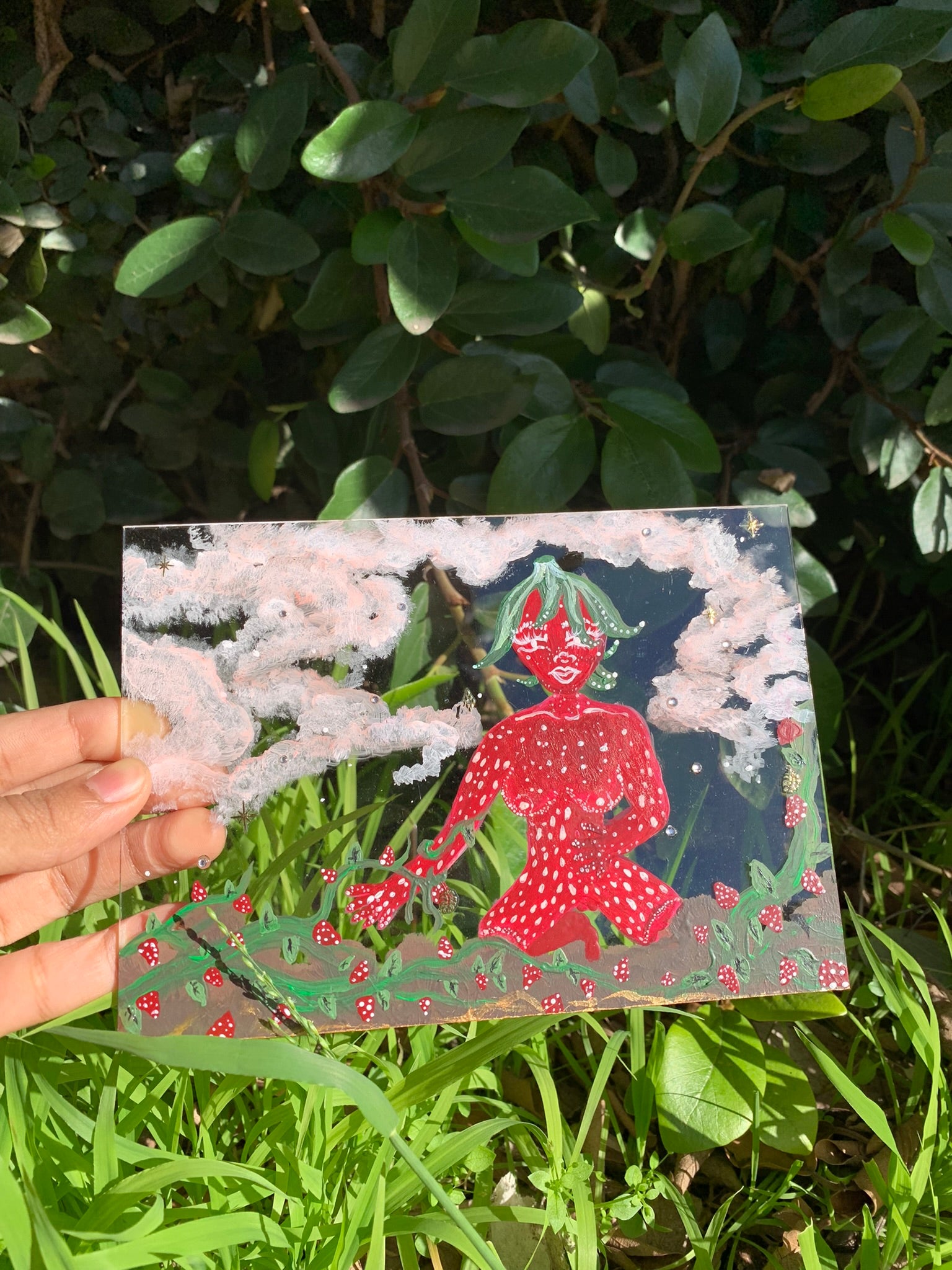 A little strawberry lady tending to her children Original Painting