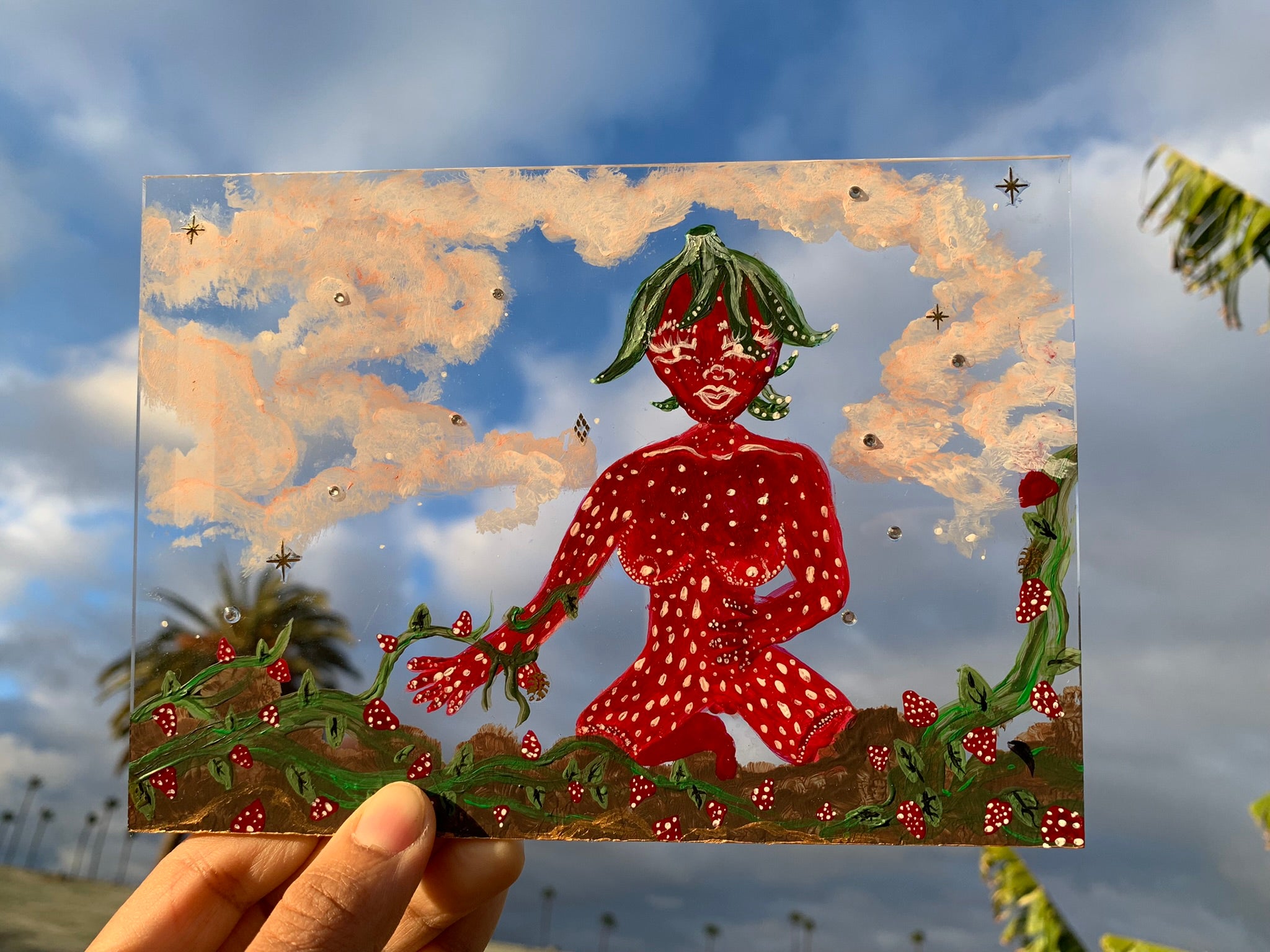 A little strawberry lady tending to her children Original Painting