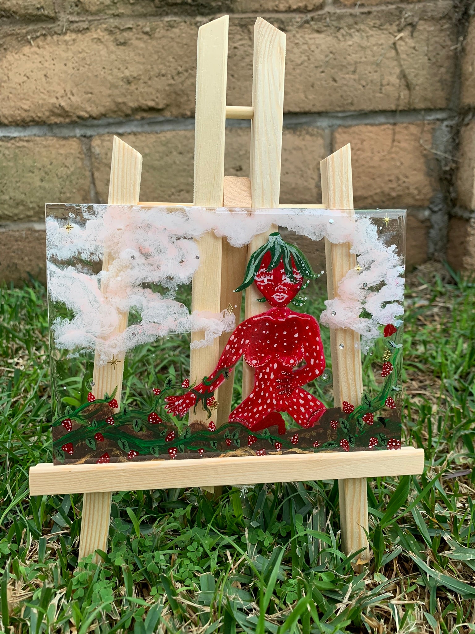 A little strawberry lady tending to her children Original Painting