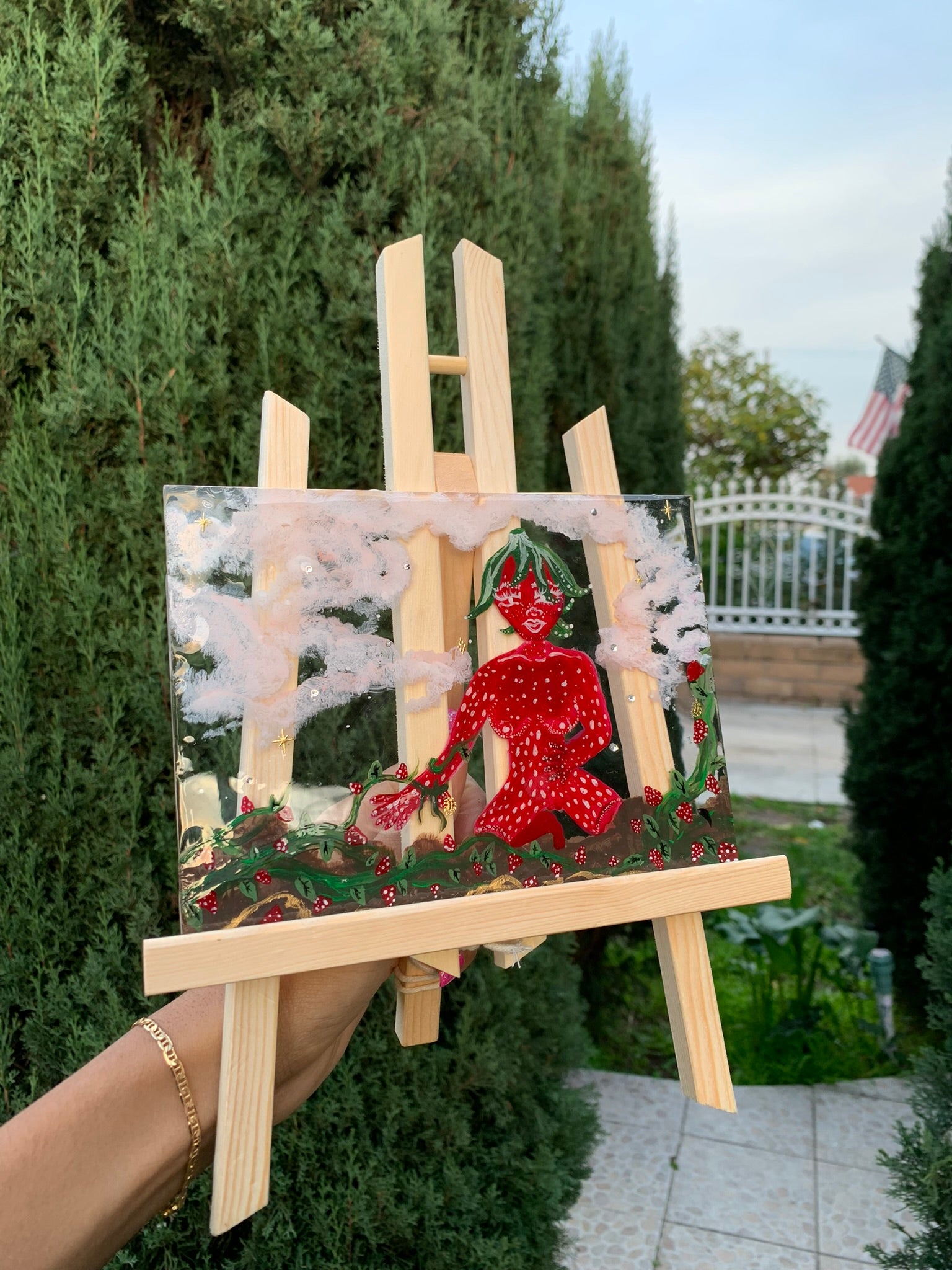 A little strawberry lady tending to her children Original Painting