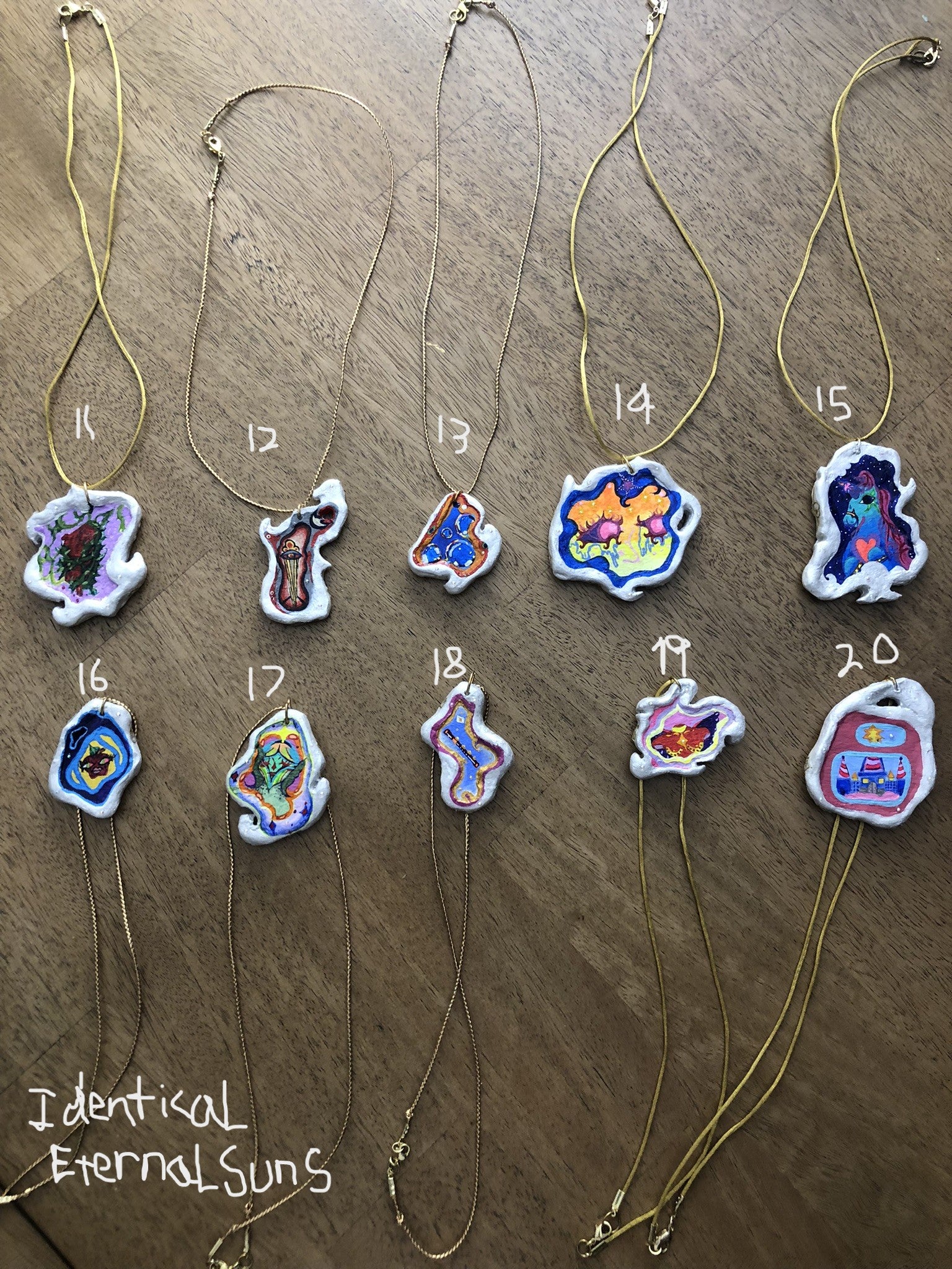 Whimsical art, Wearable necklaces, pendants, Clay jewelry, painted necklaces, colorful necklaces, whimsy jewelry, body adornment, clay amulets, handmade jewelry, One-of-a-kind necklaces, pendant necklace, unique necklaces, statement jewelry, earthy boho necklaces, boho jewelry, resin jewelry, resin pendants, resin charms, enchanting jewelry, whimsy necklaces, Beautiful ethereal jewelry, Ethereal pendant, Fairy inspired necklaces, Fairy pendant, Trippy necklace, Precious Ethereal Medallion necklace