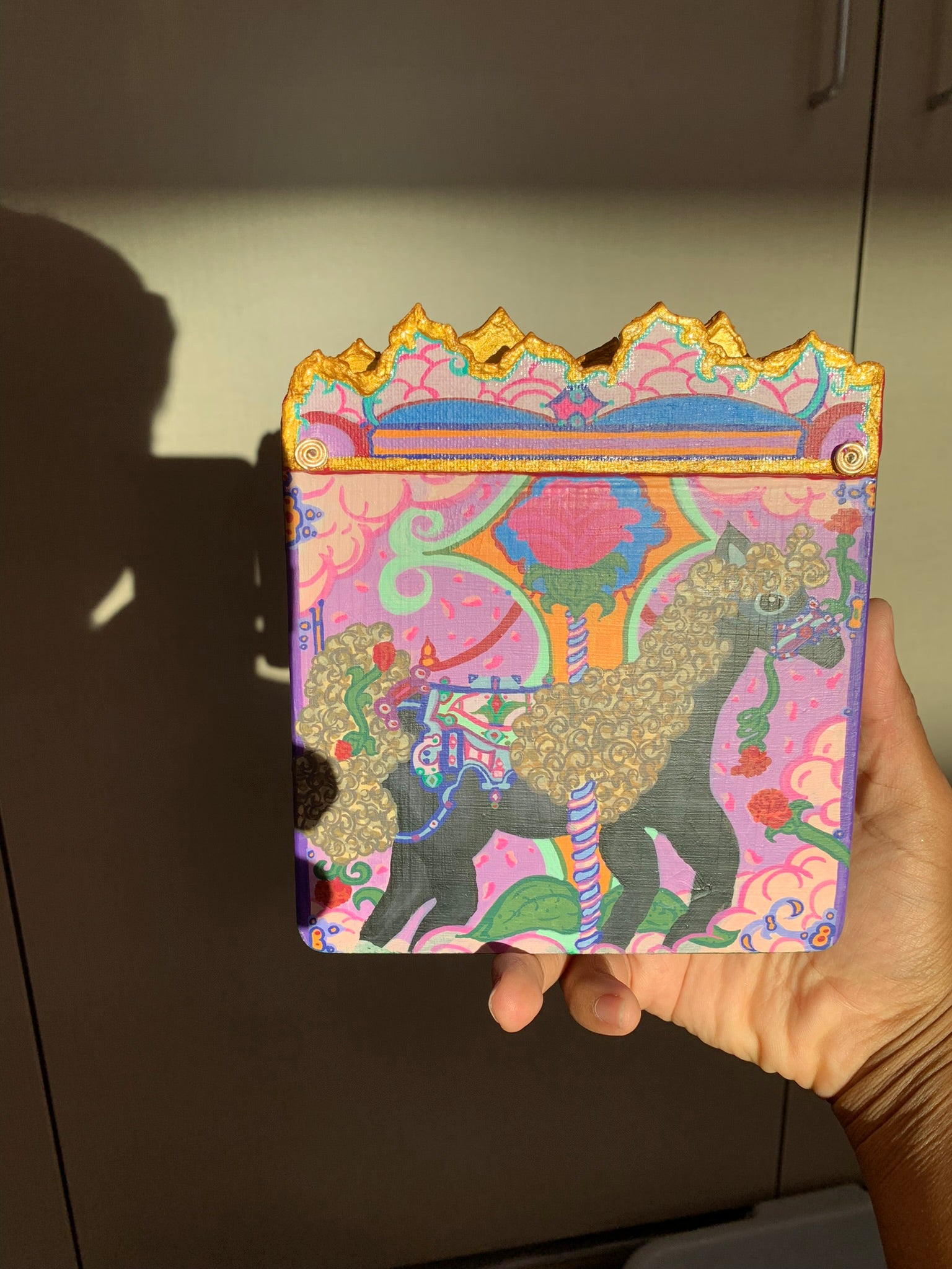 Colorful carousel-themed pony mini painting artwork. The Miraculous Carousel Girls wooden painting book, vibrantart, equineart, carouselride, merrygoroundmagic, immersiveart, nostalgickidcore, hopefulart, innocentjoy, nurserydecor, babygirlroom, childlikemagic, playfulimagination, joyfulplaytime, majesticlookbook, nurserybabyart, babygirldecor, cherishablekeepsakes, functionalsurrealism, surrealismsculpture