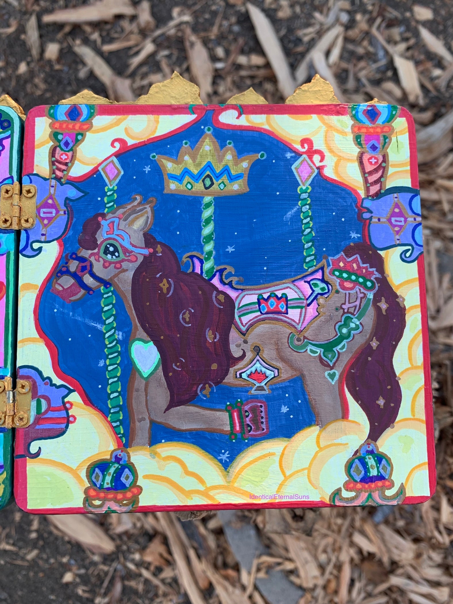 Colorful carousel-themed pony mini painting artwork. The Miraculous Carousel Girls wooden painting book, vibrantart, equineart, carouselride, merrygoroundmagic, immersiveart, nostalgickidcore, hopefulart, innocentjoy, nurserydecor, babygirlroom, childlikemagic, playfulimagination, joyfulplaytime, majesticlookbook, nurserybabyart, babygirldecor, cherishablekeepsakes, functionalsurrealism, surrealismsculpture